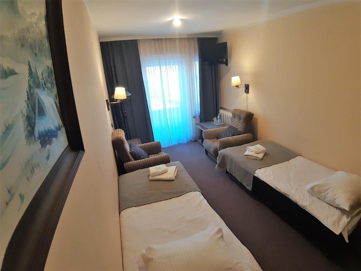 Habitación Doble con baño privado externo - 2 camas