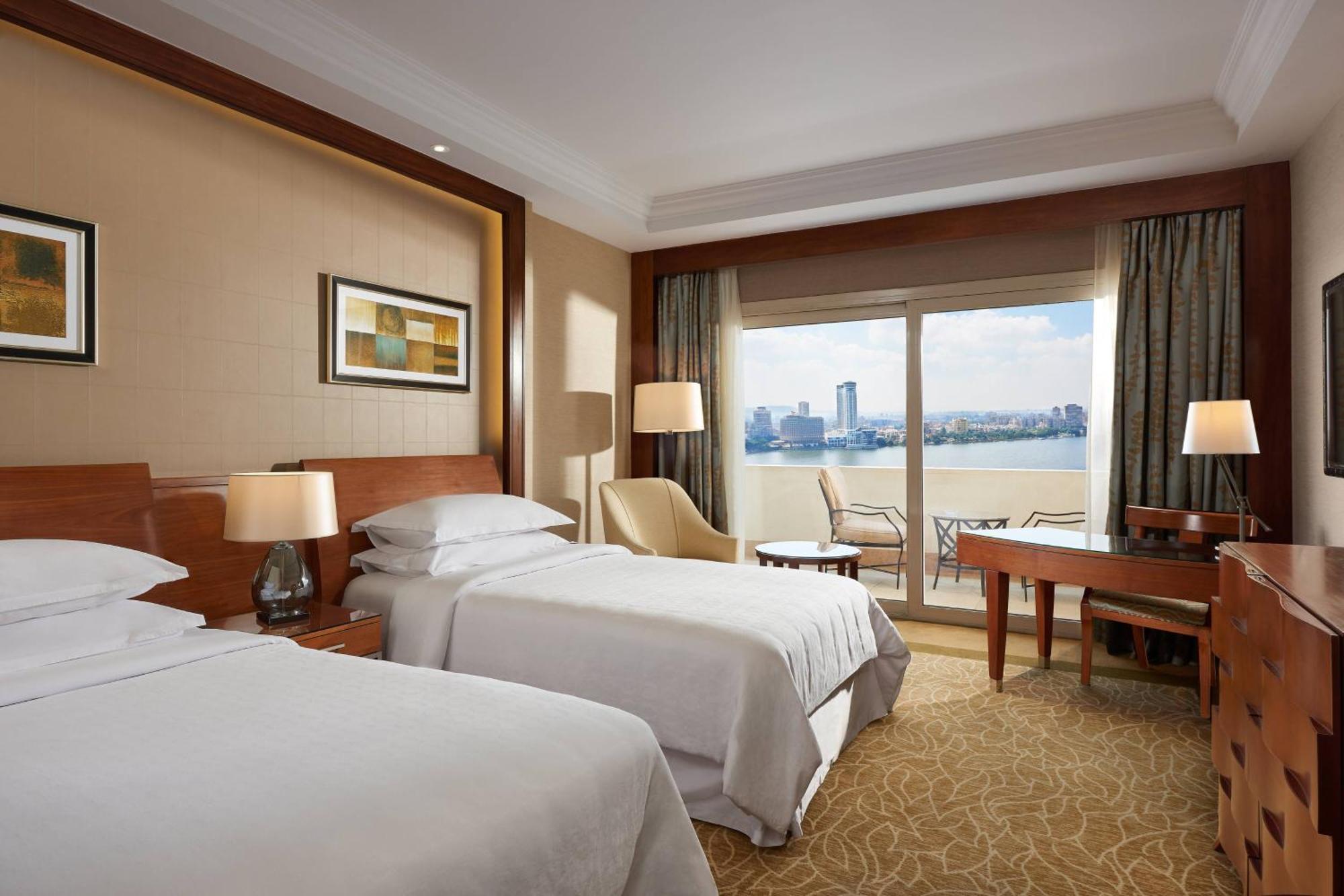 Chambre Lits Jumeaux Premium avec Balcon - Vue Partielle sur Rivière