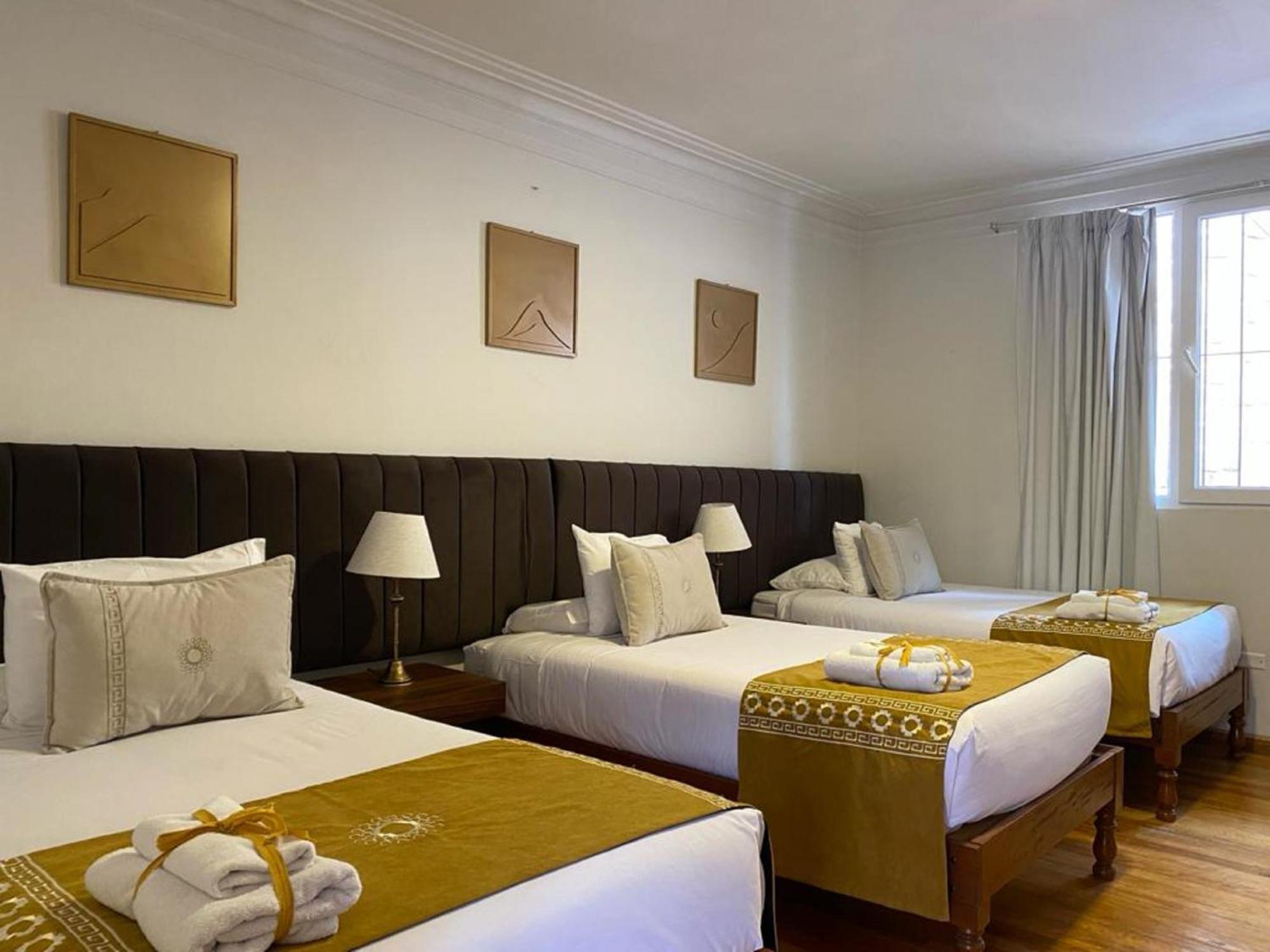 Deluxe Triple Room