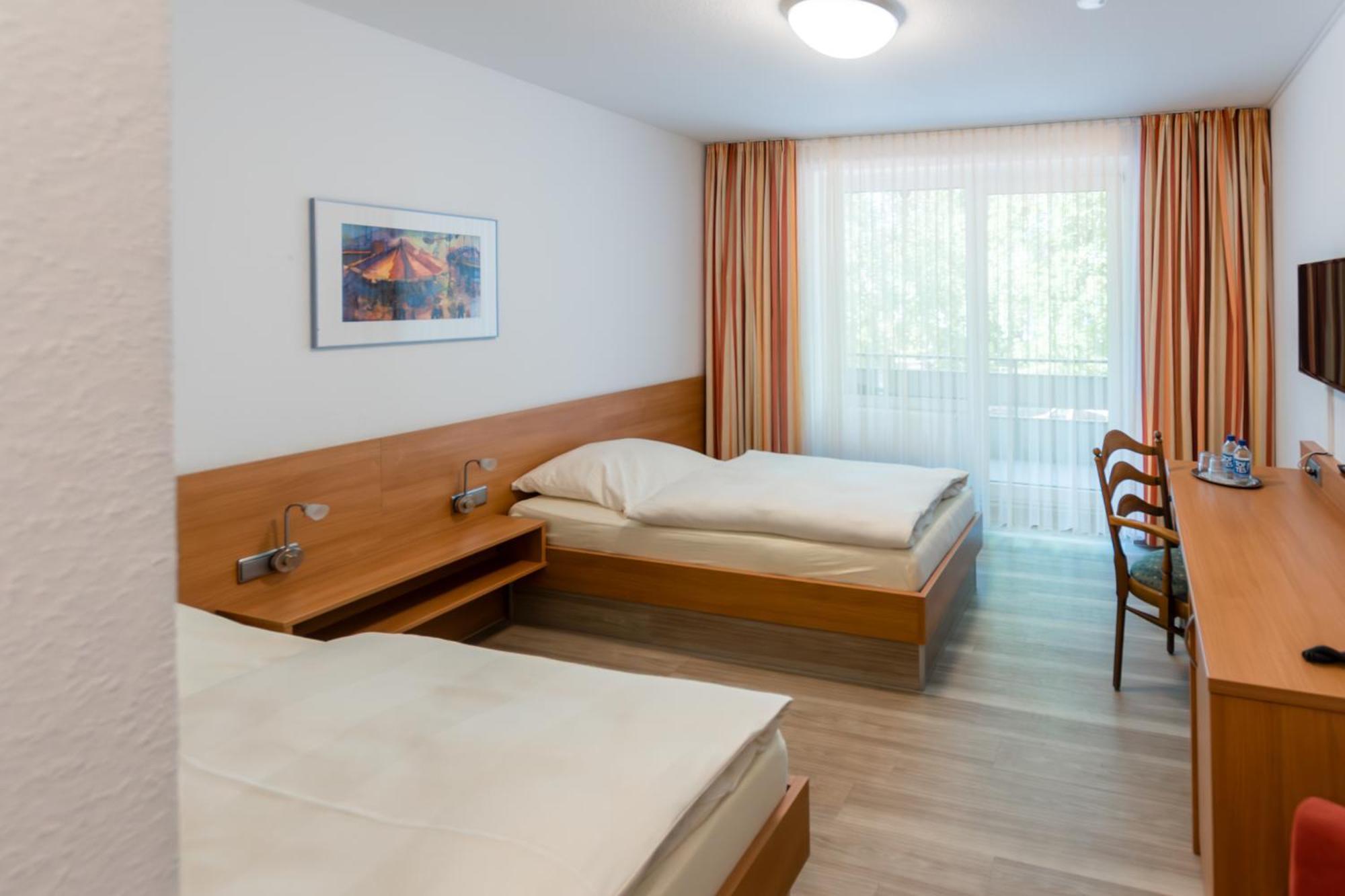 Tweepersoonskamer met 2 Aparte Bedden