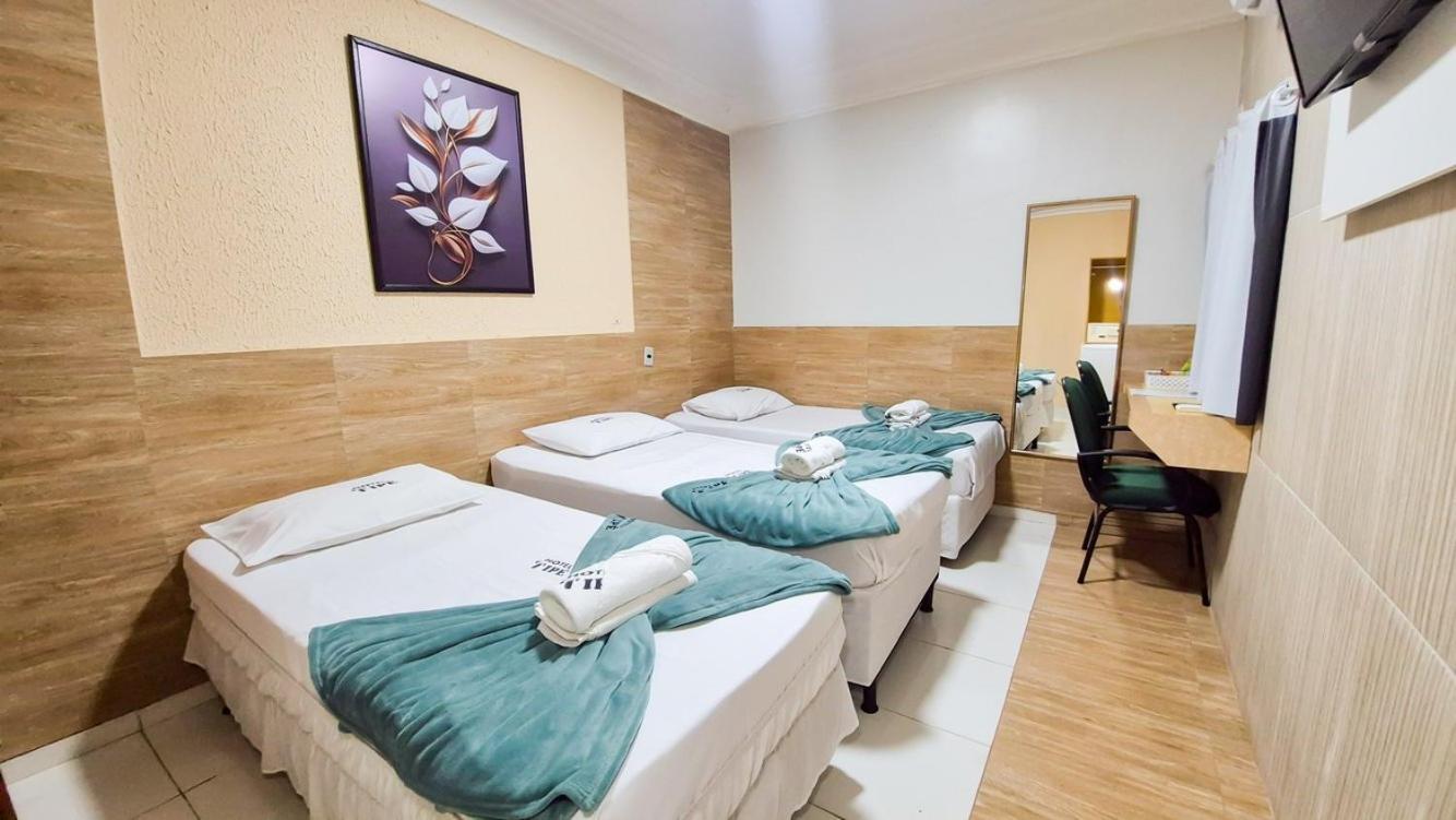 Quarto Triplo Executivo