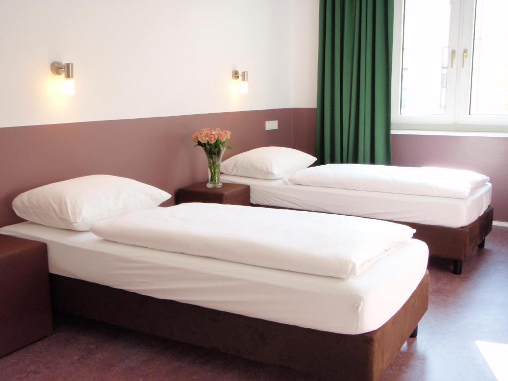 Zweibettzimmer mit Gemeinschaftsbad