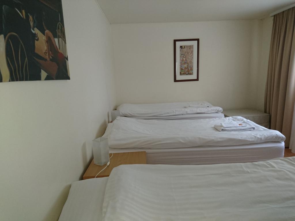 Chambre Triple avec Salle de Bains Commune
