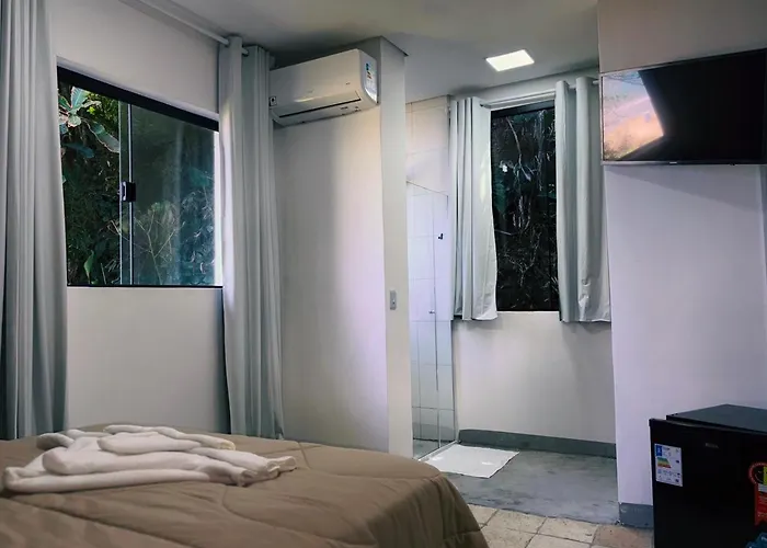 Frente ao Mar - Suites com Piscina Aquecida, SPA Privativo, Vista ao Mar ou Montanha, com Estacionamento- Raizes do Mar ECO Hotel