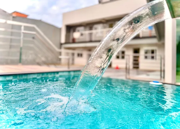 Studio aconchegante com piscina a 350m da praia