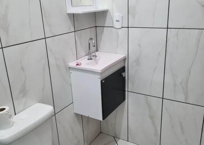 Pousada Quarto Standard com ar ,tv Wi-Fi Garagem gratuita