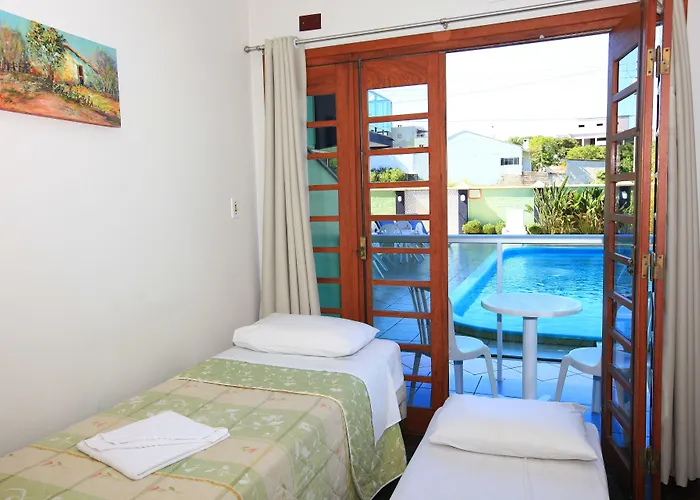 Pousada Cores Do Mar | Conforto Com Piscina Em Bombinhas