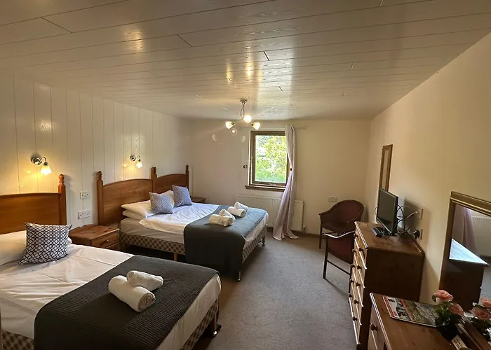 Oyo Mackay'S Travel Lodge Hotel