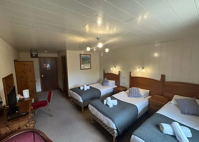 Oyo Mackay'S Travel Lodge Hotel