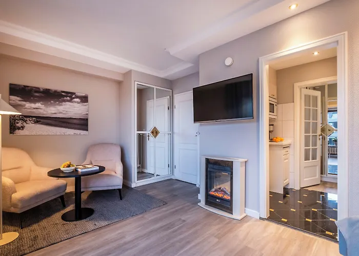 Büngers Apartment-Hotel mit Gartensauna - modern, gemütlich und strandnah